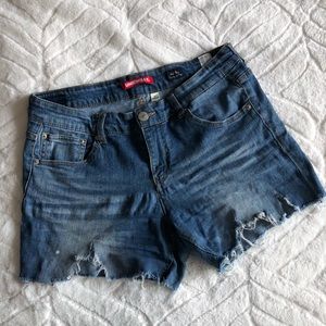Distressed blue Jean shorts